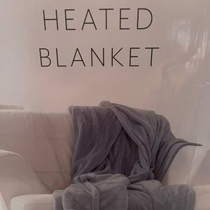 Brand new in the box full size heated blanket